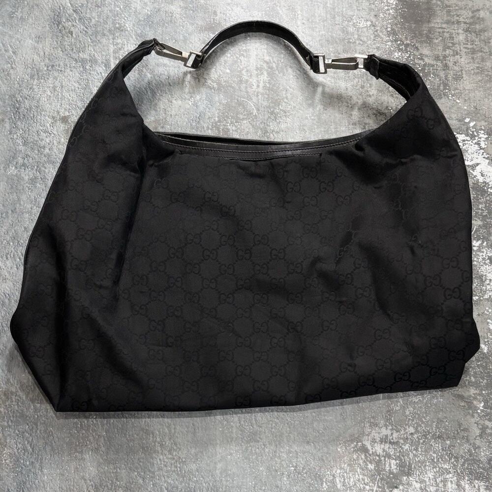 Black Gucci GG Monogram Large Hobo Bag.